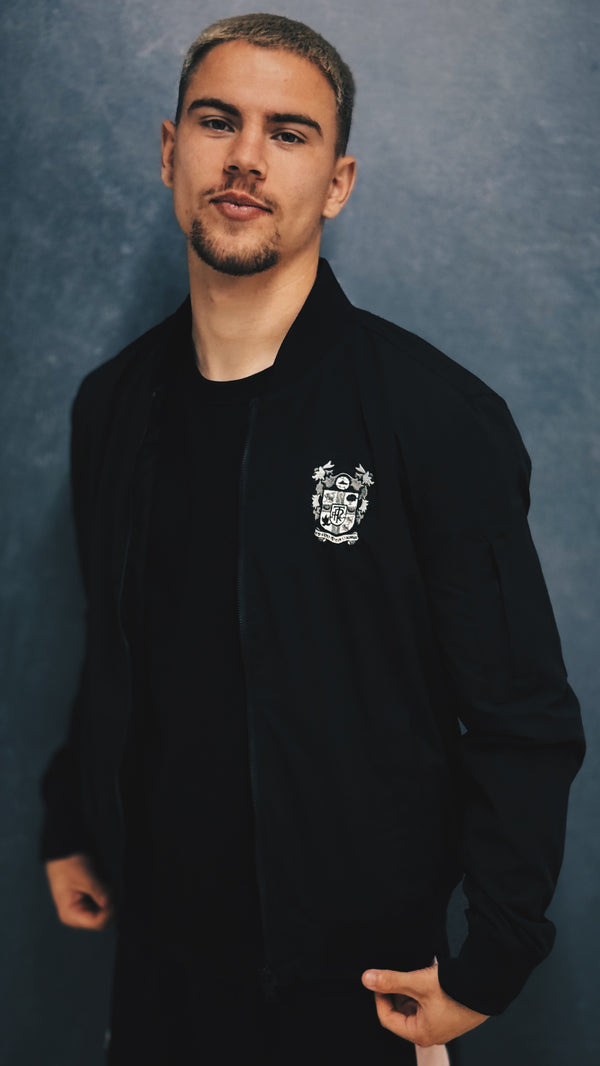 Mono Bomber Jacket – Sleek Design with Silver Crest Detail | Black