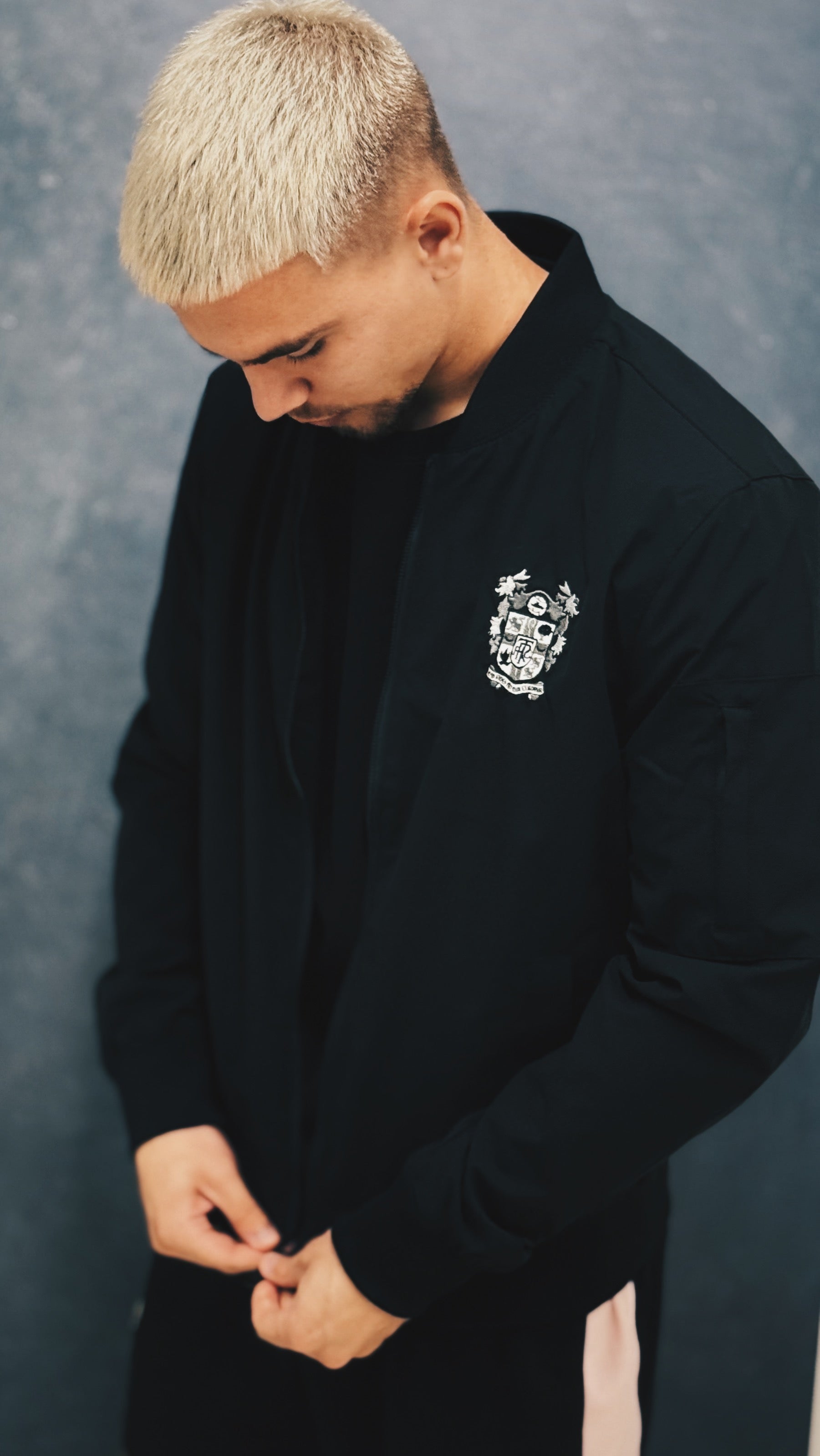 Mono Bomber Jacket – Sleek Design with Silver Crest Detail | Black